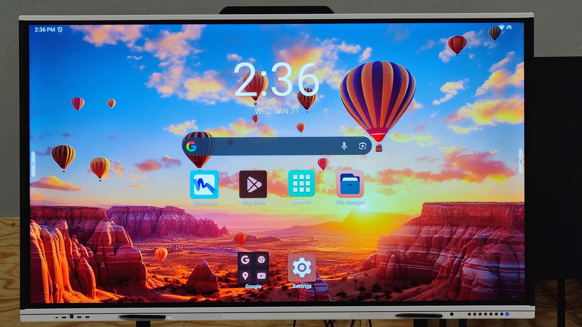 WEONEX MP Series 86-inch interactive smart panel in a corporate conference room